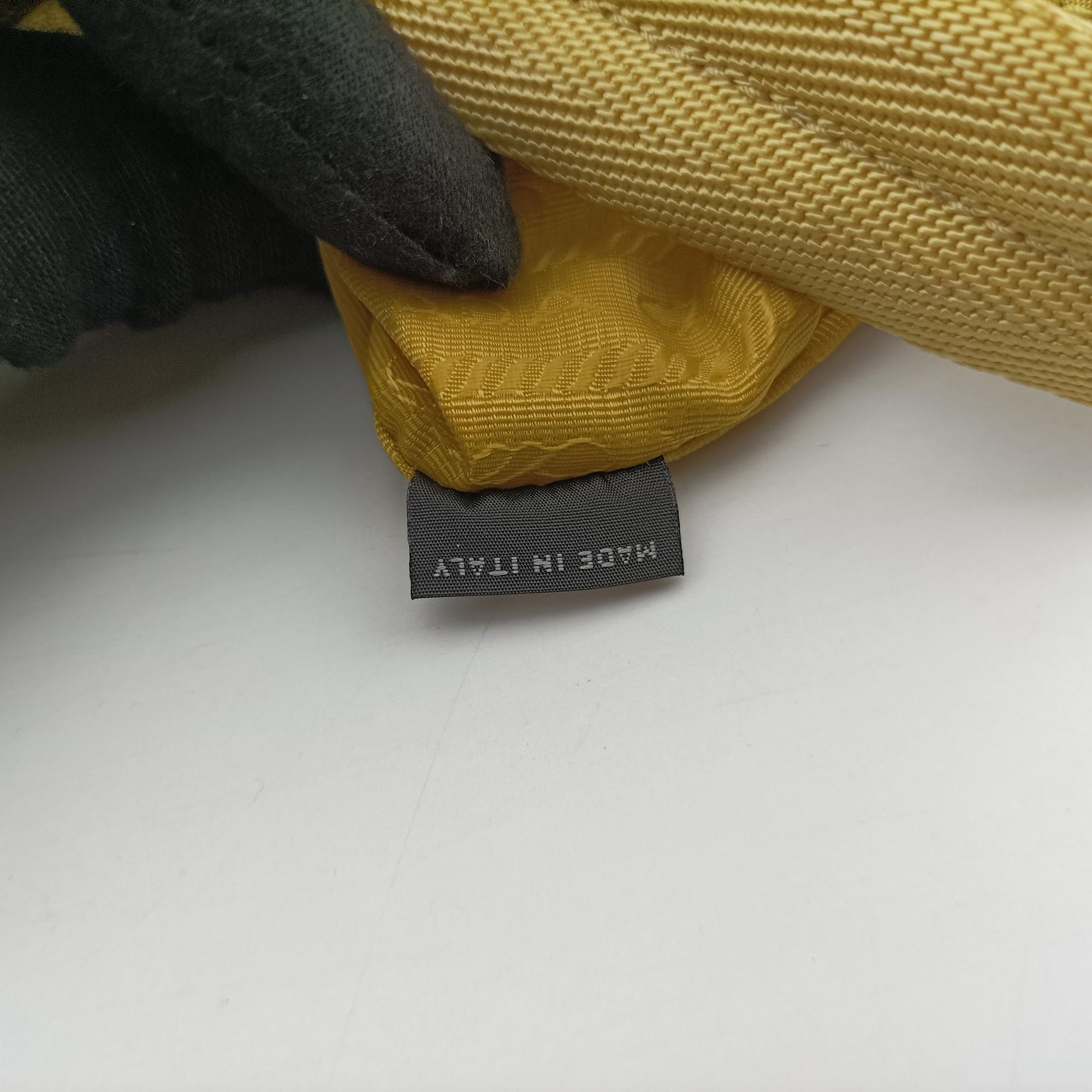 Secondhand Prada Re-Edition2000 Yellow nylon 1NE515 handbag | stylenewstar