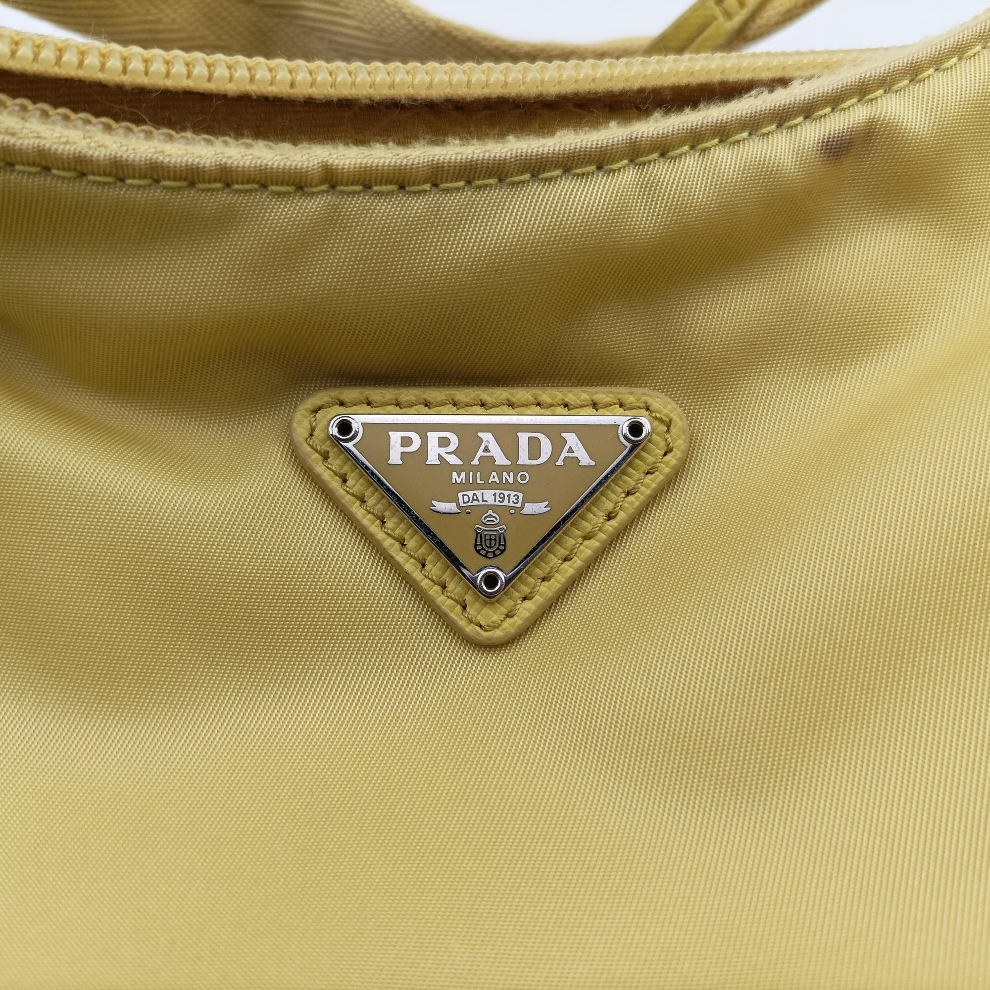 Secondhand Prada Re-Edition2000 Yellow nylon 1NE515 handbag | stylenewstar