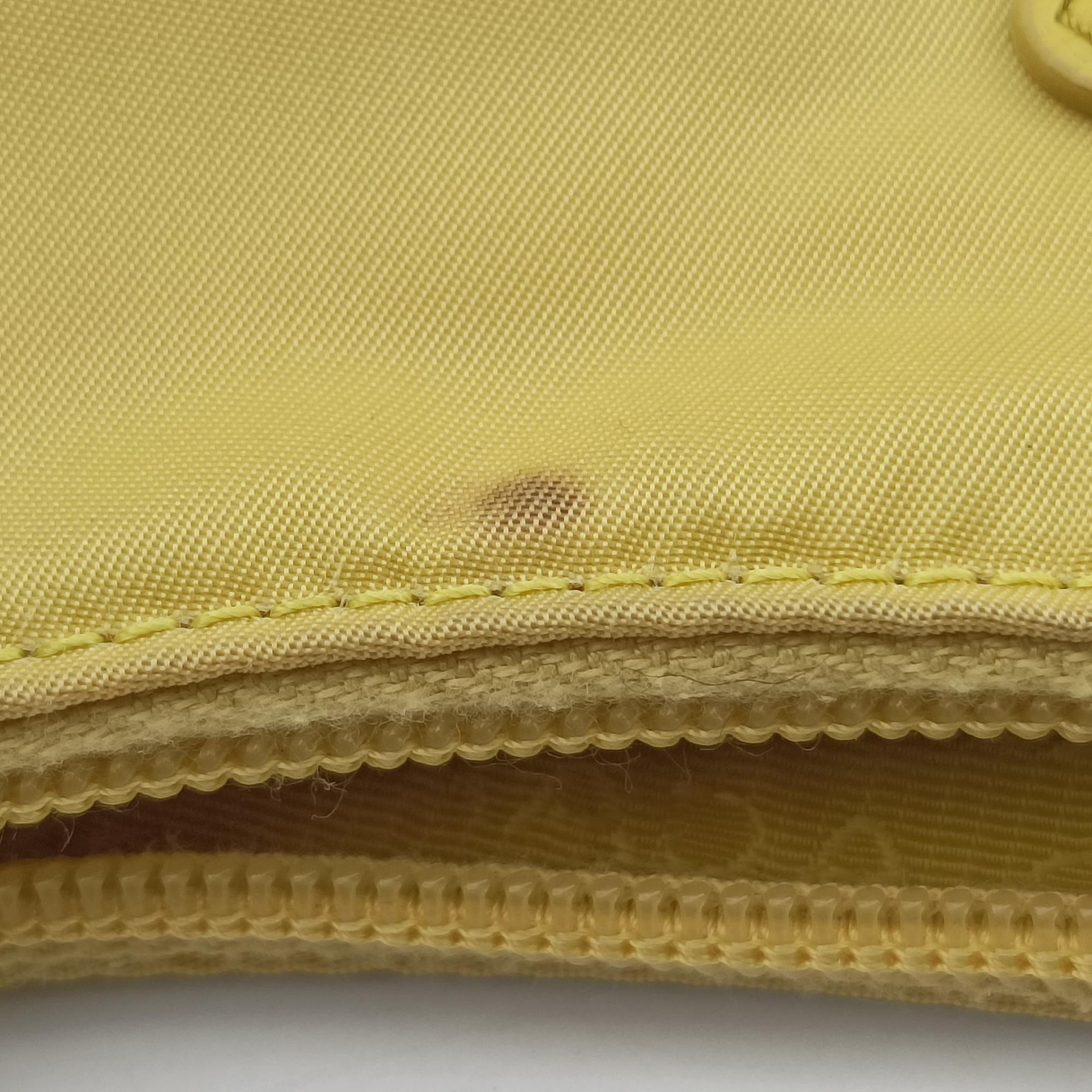 Secondhand Prada Re-Edition2000 Yellow nylon 1NE515 handbag | stylenewstar