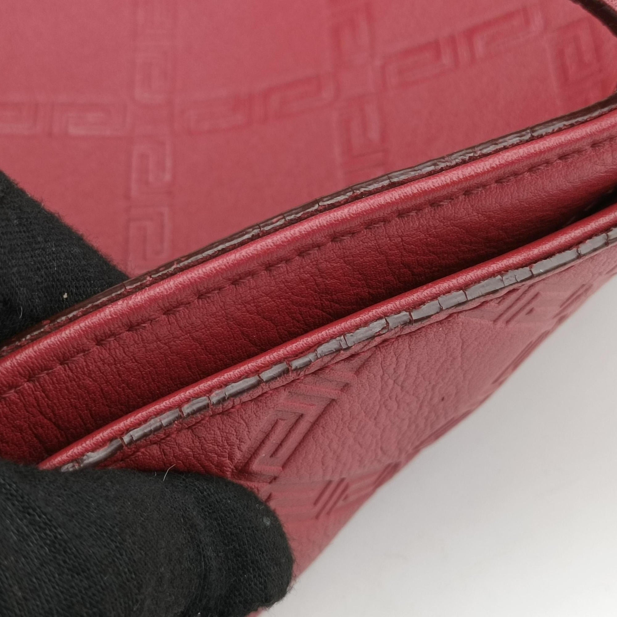 Pre-owned VERSACE Medusa Red Leather  handbag | stylenewstar