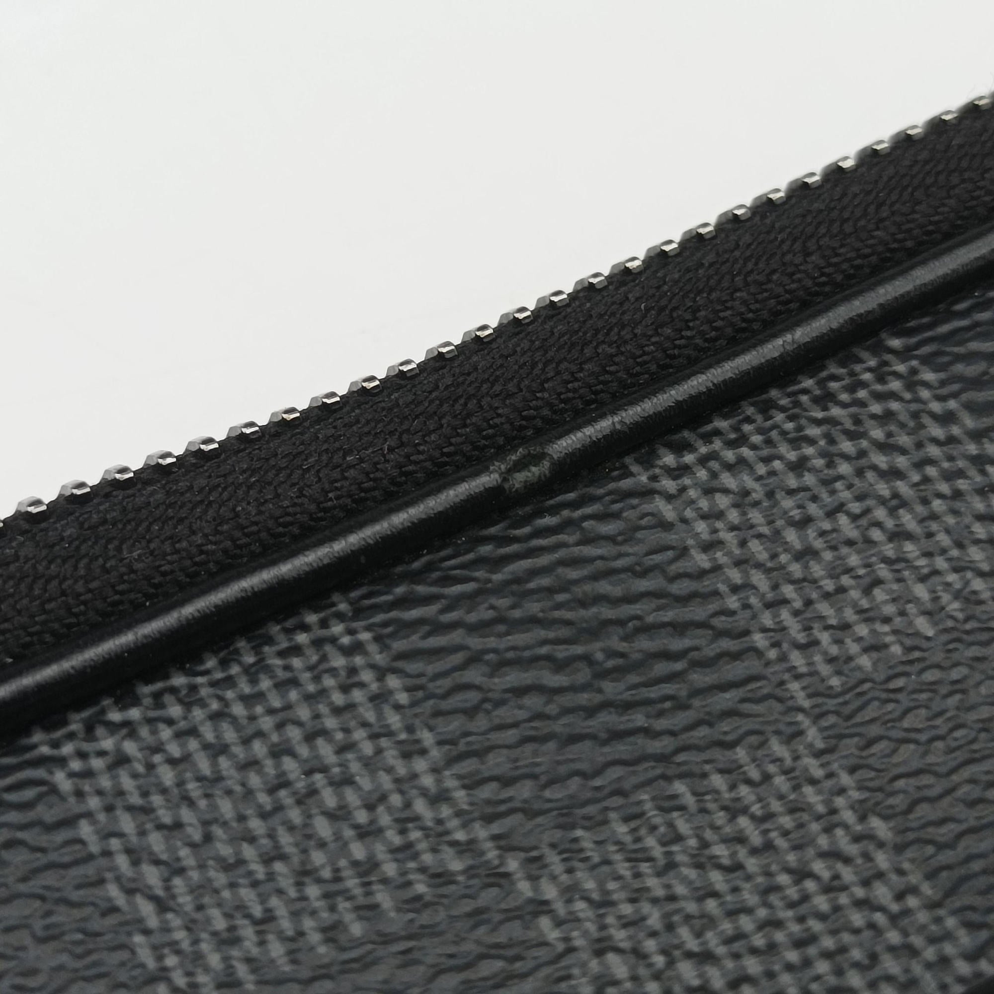 Pre-owned Louis Vuitton Utility Supplement Noir Damier Graphite N60324 clutchbag | stylenewstar