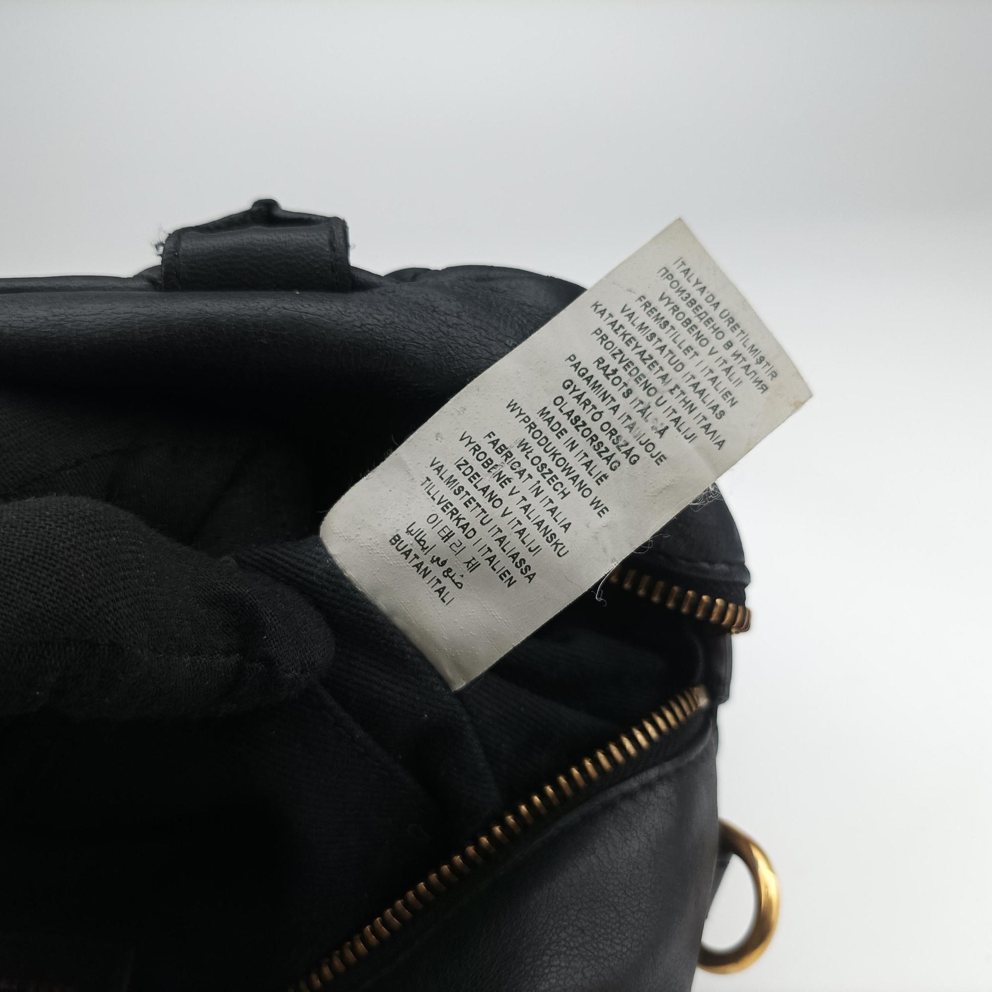 Secondhand VERSACE Devotion Black Leather  handbag | stylenewstar