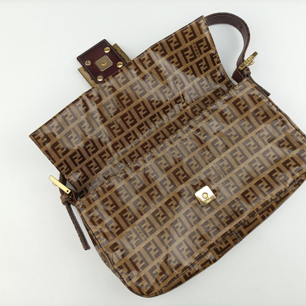 Pre-owned Fendi Baguette Brown PVC coated canvas 240826 handbag | stylenewstar