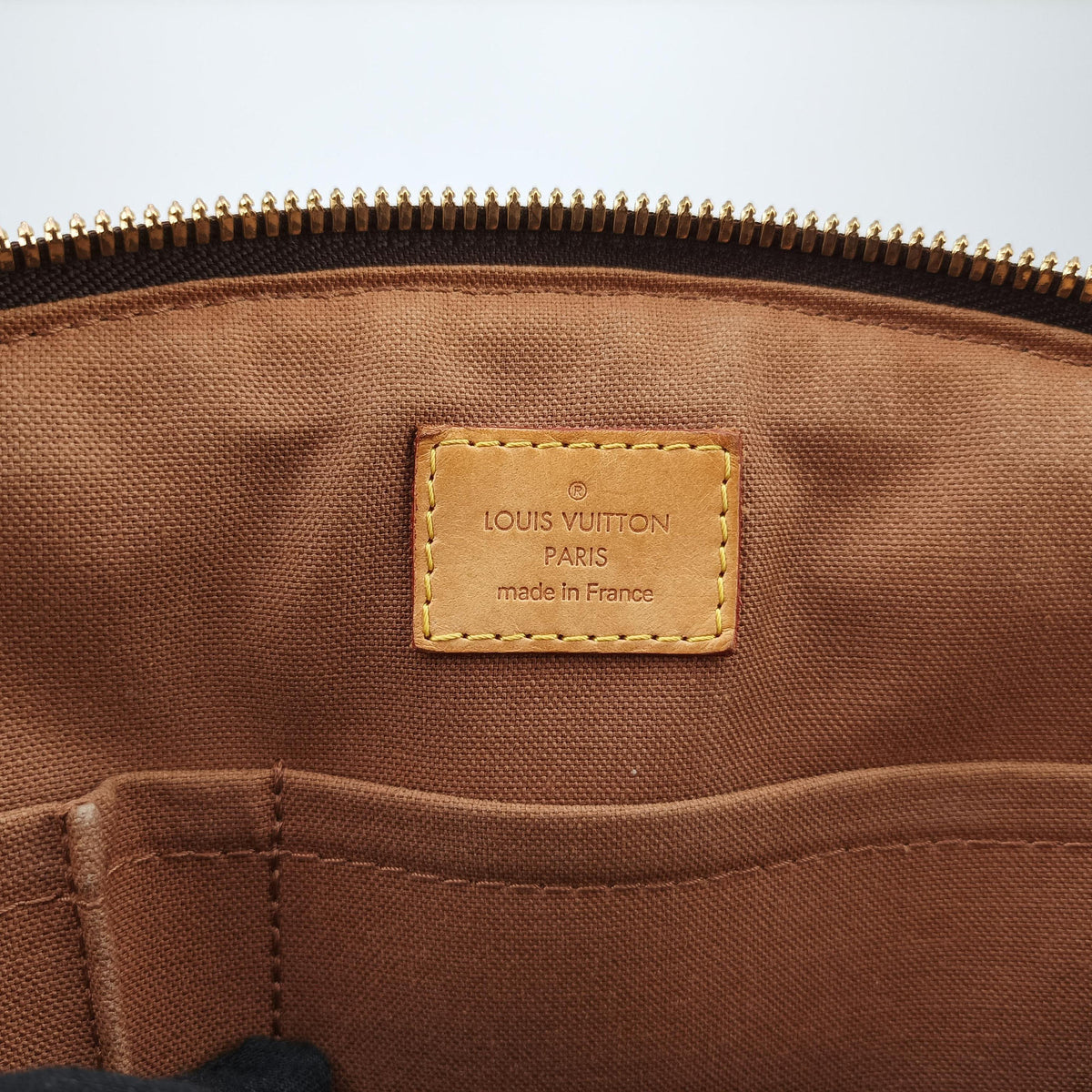 Secondhand Louis Vuitton TIVOLI PM brown Monogram Canvas M40143 handbag | stylenewstar