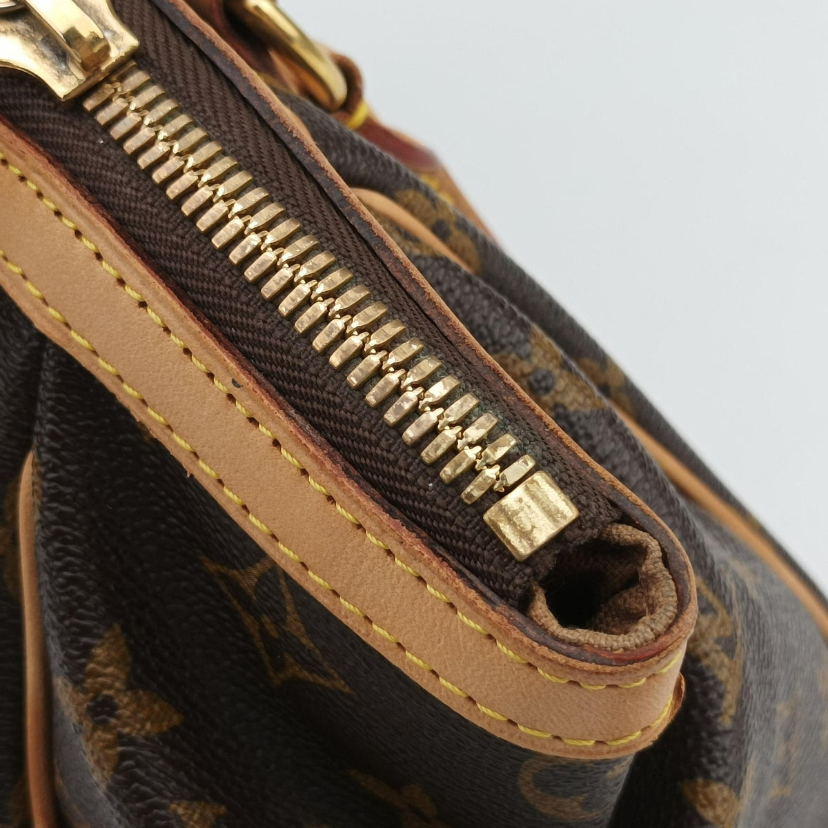 Secondhand Louis Vuitton TIVOLI PM brown Monogram Canvas M40143 handbag | stylenewstar