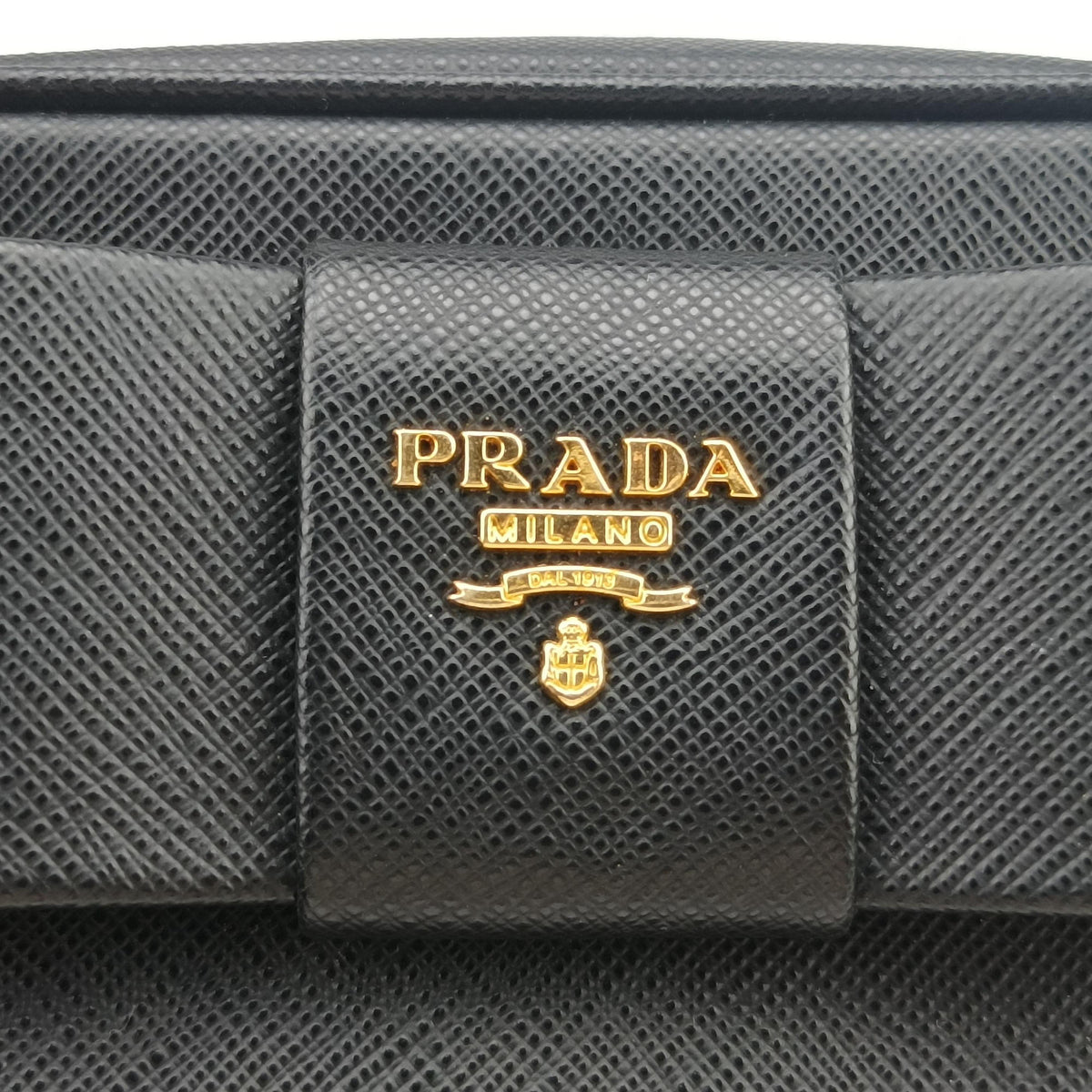Vintage Prada Ribbon Mini Pochette Black SAFFIANO Leather 1NF674 clutchbag | stylenewstar