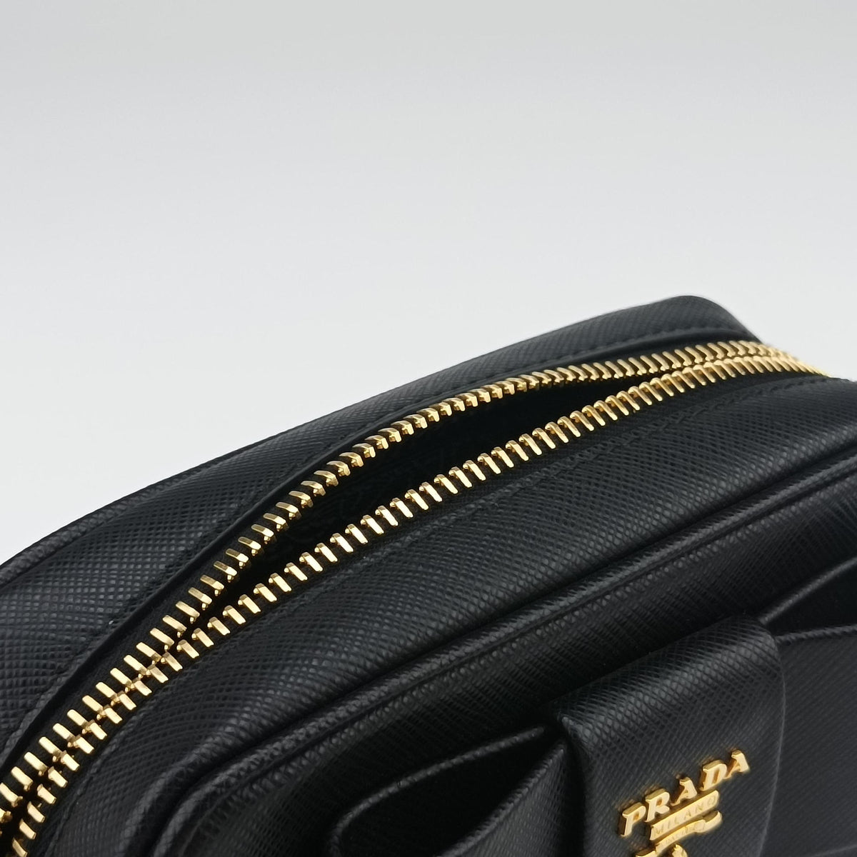 Vintage Prada Ribbon Mini Pochette Black SAFFIANO Leather 1NF674 clutchbag | stylenewstar