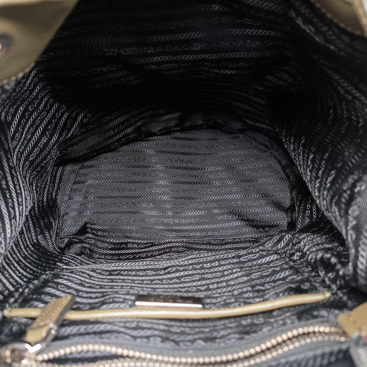 Pre-owned Prada Triangle logo Green Leather BZ032L backpack/rucksack | stylenewstar