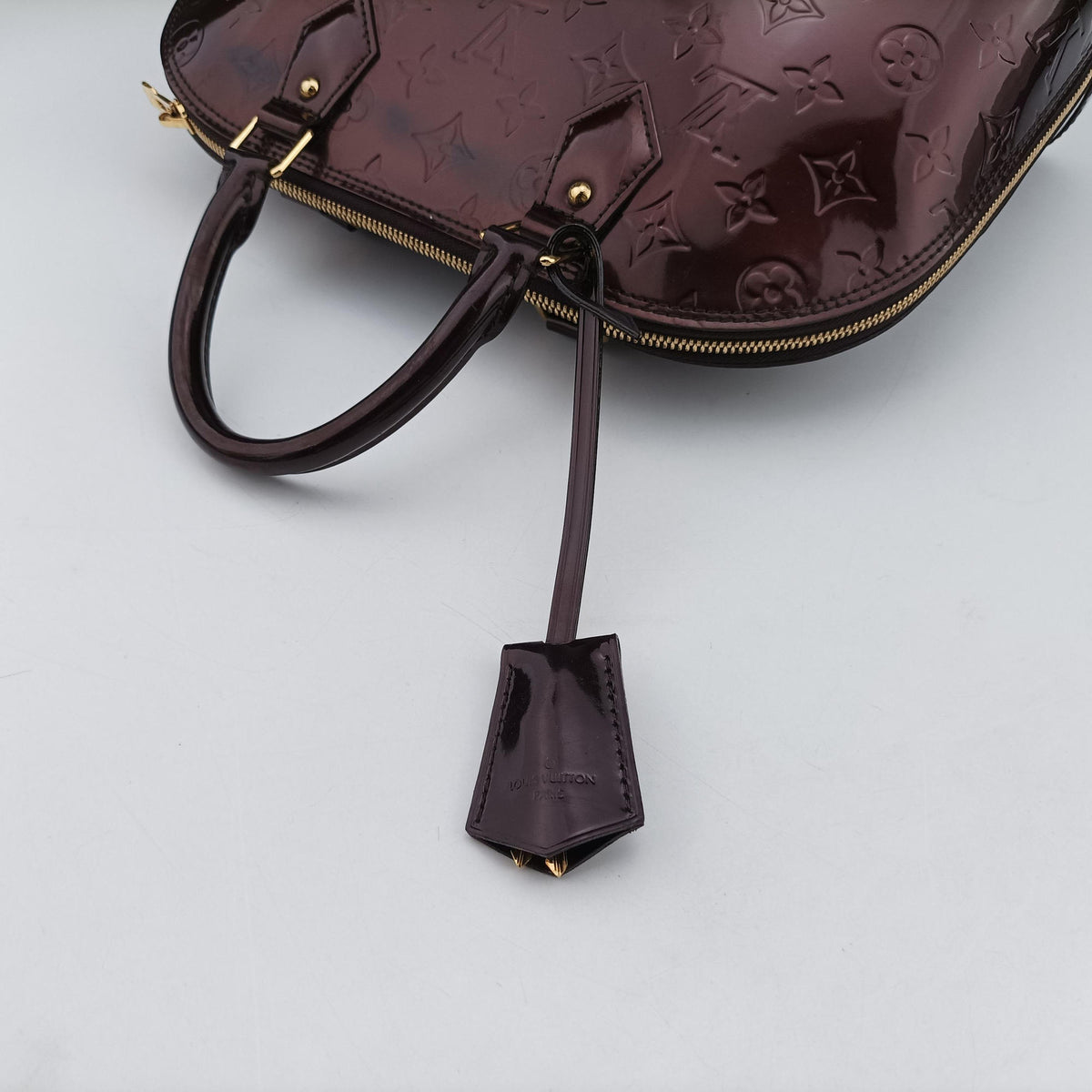 Secondhand Louis Vuitton Alma PM Amarante Vernis M91611 handbag | stylenewstar